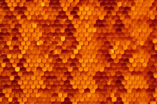 Close-up of a honeycomb pattern with warm, golden, hexagonal shapes
