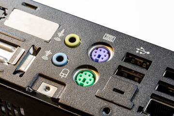 Close-up view of a computer motherboard featuring old obsolete no longer used PS 2 ports for...