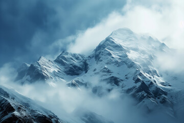 clouds form on snow covered mountains