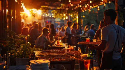 Selbstklebende Fototapeten Capture the ambiance of an evening at a pizzeria terrace. as the sun sets, people gather on the open terrace © olegganko