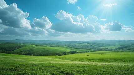 Fototapeta premium Rolling hills blanketed in a patchwork of emerald green fields