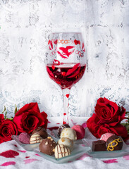 wine, roses and chocolates, a romantic still life for Valentine's day