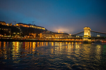 Fototapeta premium Parliament building in Budapest, Hungary at Night. Danube river and City at night
