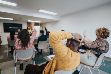 Engaged adults participating in an educational workshop, actively raising hands to ask questions in a well-lit modern classroom.