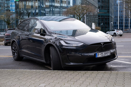 black electric car tesla, Model X on street, popular Elektro-SUV from company Elon Musk, alternative energy development, clean energy, ev innovation, Frankfurt, Germany - February 10, 2024