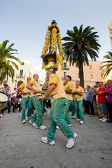 the annual Candelieri festival, medieval guilds stagger through the streets of Sassari, Sardinia,...