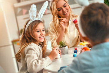 Obraz na płótnie Canvas Family getting ready for Easter