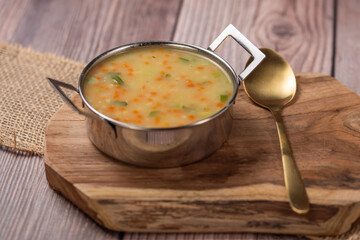 Chicken Ceram soup, Asian Thai food,Coconut Chicken Soup, Chicken soup in a small silver pot