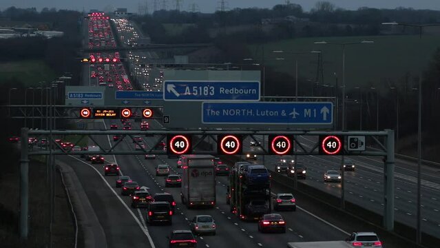Luton, UK - February 11, 2024: Heavy evening traffic on busiest British motorway M1 near town Luton caused by long term roadworks on the motorway between junction 10 and 11.