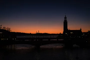 Foto op Canvas silhouette of stockholm city hall at sunset © Per