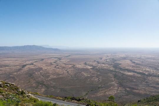 View from Vanrhyns Pass on Road R27 at the Northern Cape Province in South Africa under blue sky.