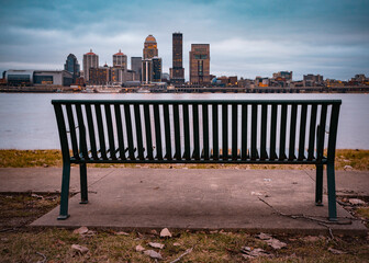 Louisville Kentucky skyline with Ohio River and bench - 733460239