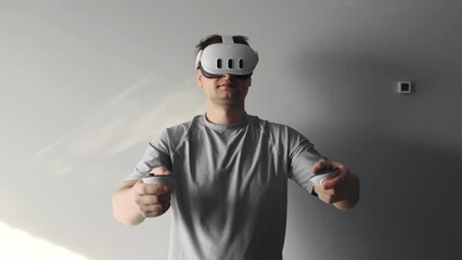 Emotional impressions from using a VR AR headset. The man's face is beaming with happiness.