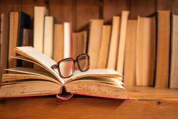 glasses on open book in a bookstore