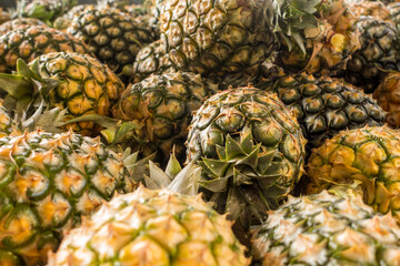 pineapples in a market