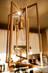 Light bulb in a beautiful interior lighting design for the house or kitchen