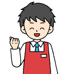 エプロンをつけた男性店員がガッツポーズしている