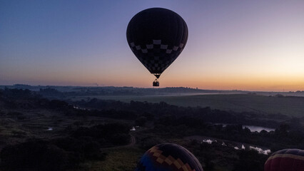 balloons in the city of Piracicaba with a beautiful sunrise