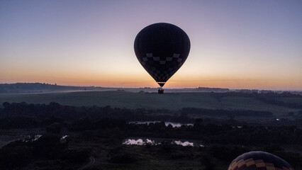 balloons in the city of Piracicaba with a beautiful sunrise