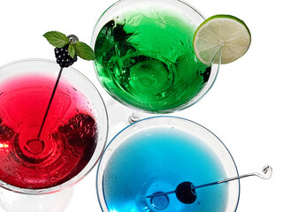 Red, green and blue martini cocktails, top view, close up on white background - 733469892