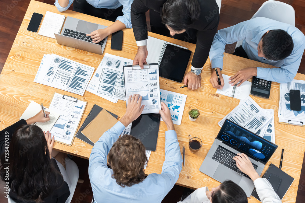 Poster top view diverse group of business analyst team analyzing financial data report paper on meeting tab
