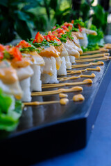 Red Dragon Roll served on a black wooden plate, avocado, cucumber, lump crab meat, sushi menu, social media post, food photography, fine dining, Japanese food, purple background