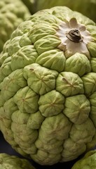 Obraz premium A close-up view of a group of ripe, vivid Cherimoya with a deep, textured detail.