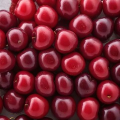 A close-up view of a group of ripe, vivid Cherry with a deep, textured detail.