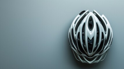 Contemporary white bicycle helmet on a gray background