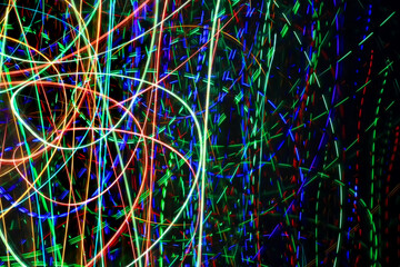 Abstract blurry background from colorful traces of lights
