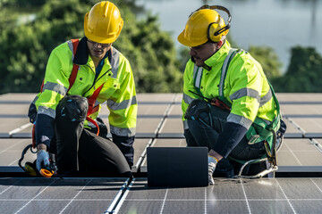 Worker Technicians are working to construct solar panels system on roof. Installing solar photovoltaic panel system. Alternative energy ecological concept. Renewable clean energy technology concept.