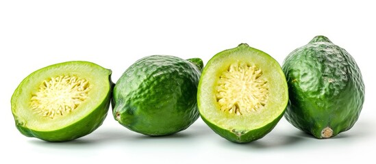 Feijoa fruit on white background, vegan and raw, as a juice ingredient with skin.