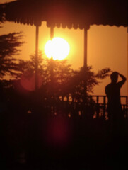 sunset in the city with silhoutte person