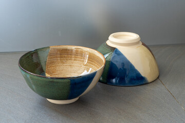 Two bowls on a grey table. High quality photo
