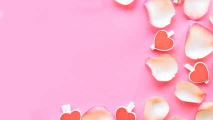 Gentle white rose petals on pink background. Flat lay, top view, copy space. Valentines Day or...
