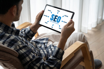 SEO search engine optimization for modish e-commerce and online retail business showing on computer...