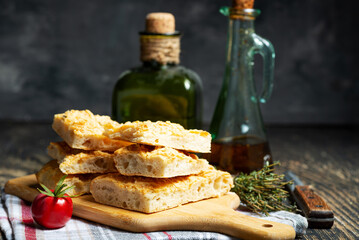 Traditional Italian focaccia bread with salt and olive oil. Homemade flat bread focaccia