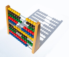 wooden children's abacus with colored beads to learn to count