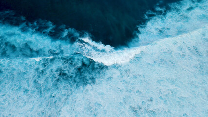 Turquoise ocean sea water white wave pattern splashing deep blue sea. Seascape dark ocean...