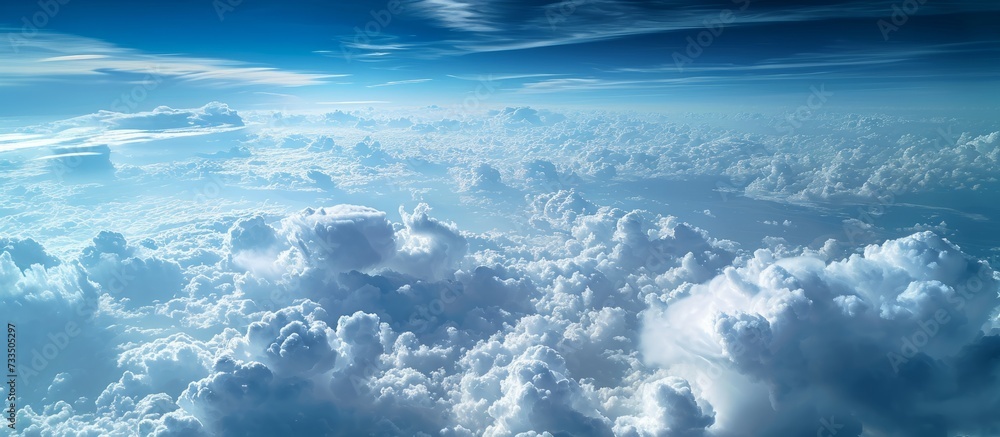 Wall mural stunning white clouds view from above the airplane window: an immersive white clouds view from above