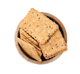 Cereal crackers with flax and sesame seeds in bowl isolated on white, top view