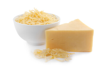 Grated and whole piece of cheese isolated on white