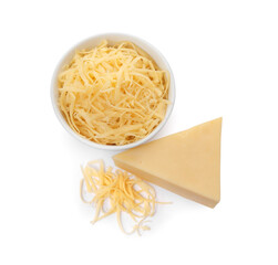 Grated and whole piece of cheese isolated on white, above view