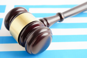 Greece law, Legal, justice and agreement, wooden court gavel on flag.