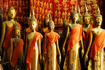 Buddha statues in Wat Xieng Thong in Luang Prabang , Laos ,South East Asia