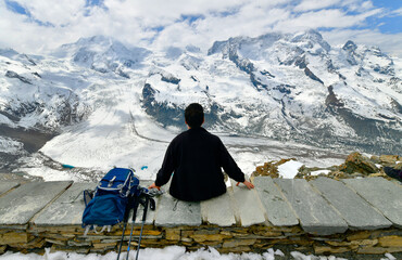 Tourists are enjoying the view of the Gorner Glacier in Zermatt, Switzerland	