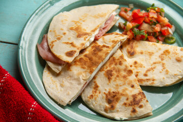 Savory stacks: Sincronizadas with melted cheese and ham.