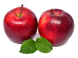Two red apples with leaves isolated on white background