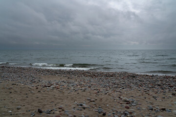 View of the Baltic Sea and a pebble beach on a cloudy summer day, Svetlogorsk, Kaliningrad region, Russia