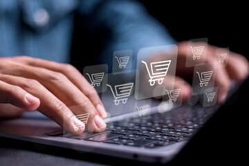 Person use laptop with online shopping cart icon for business ecommerce concept, online purchase, ecommerce store, online business, shopping on the internet.